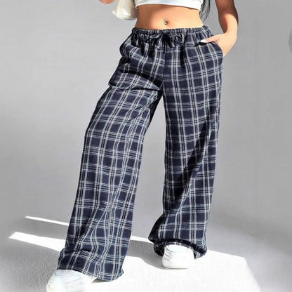 Women's loose plaid trousers with drawstring waist and pockets in red or blue colour options