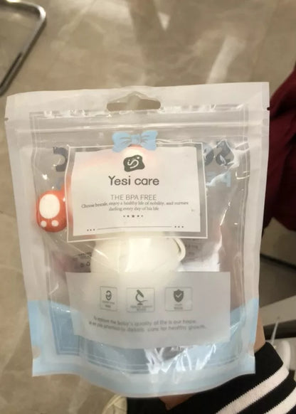 Dual-purpose baby food feeder in blue and red for safe fruit and vegetable introduction