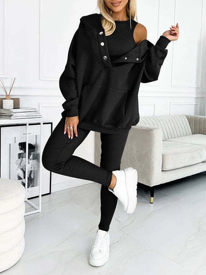 Women's 3-piece sports suit featuring a hooded sweatshirt with pockets and slim trousers