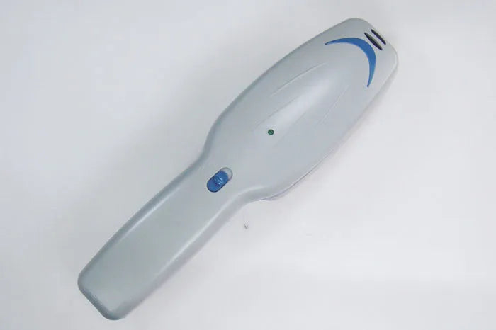 White pet grooming comb with negative ion and ozone technology, removable brush head, 21.5cm long.