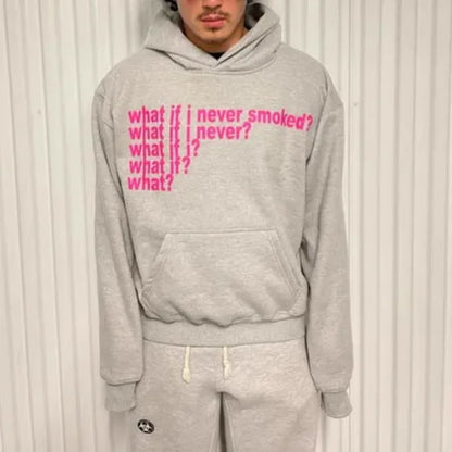 Black hooded pullover sweater with a large letter print on the front, shown on a model.