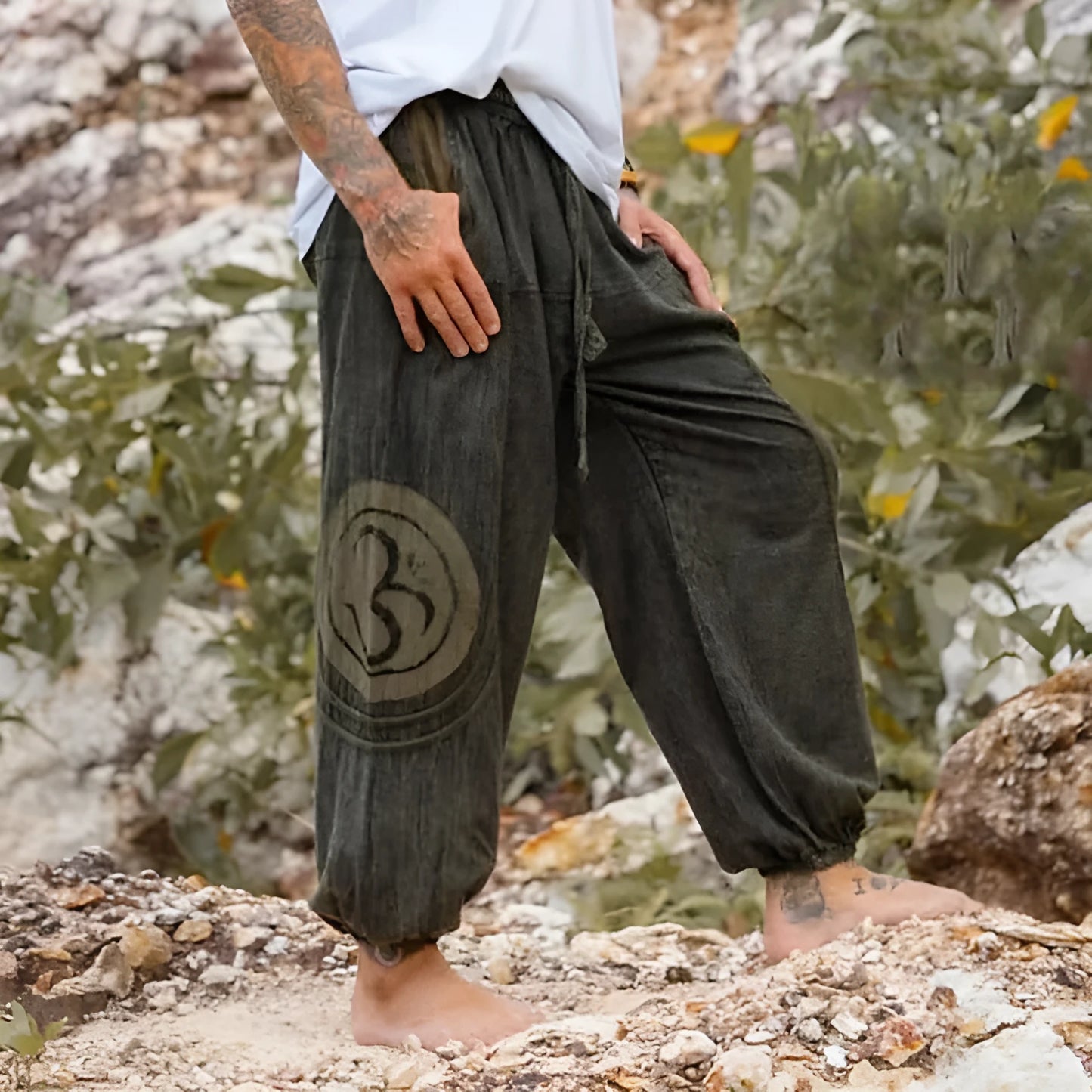 Dark green ethnic patterned men's trousers with ankle ties and mid waist fit