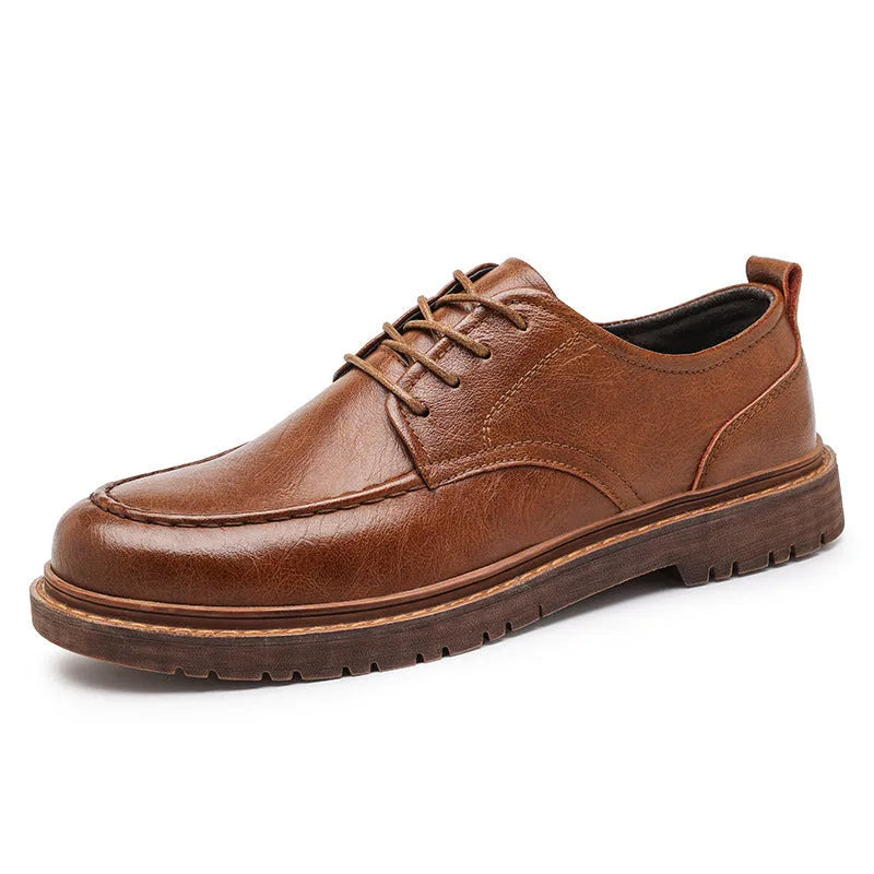 Brown casual leather shoes with round toe, flat heel, and visible sewing lines on the cowhide upper.