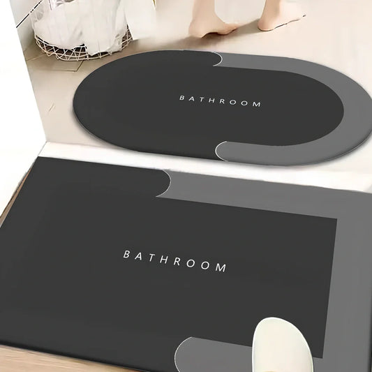 Two-piece Natsume anti-slip bathroom mats 45x70cm in dark grey, machine-woven blended fibres for wet floor grip