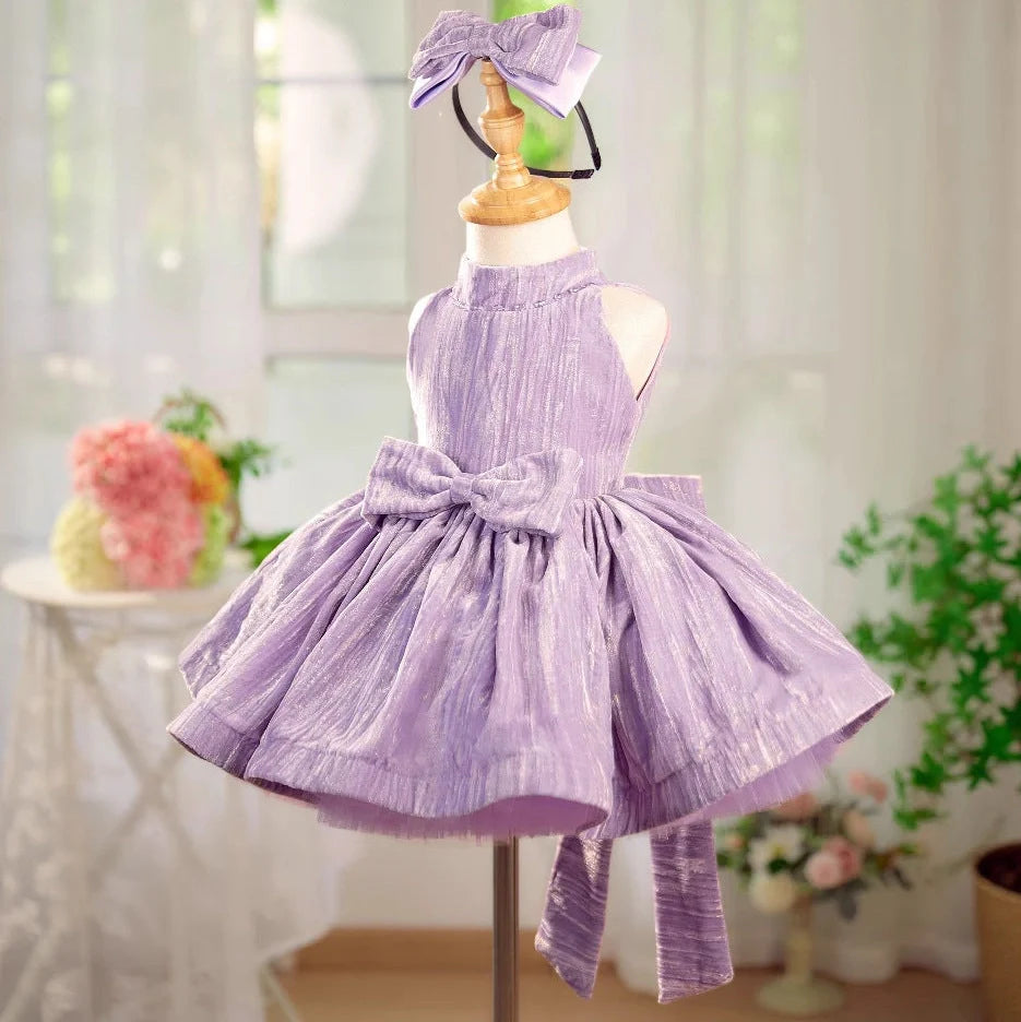 Girls' dreamy purple velvet princess dress showing princess silhouette and velvet texture