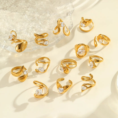 Geometric zircon ring showing round, oval and quadrangular design elements in stainless steel with electroplated finish