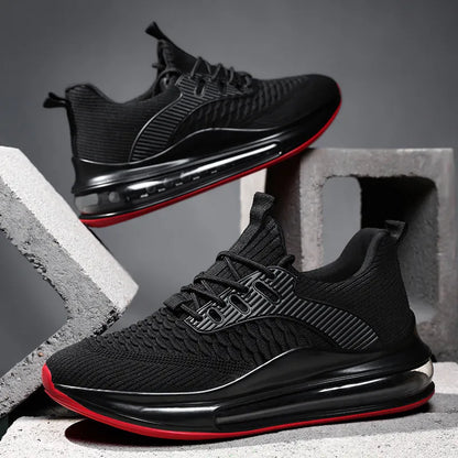 Men's black low-top mesh running shoes with lace-up front and platform sole.
