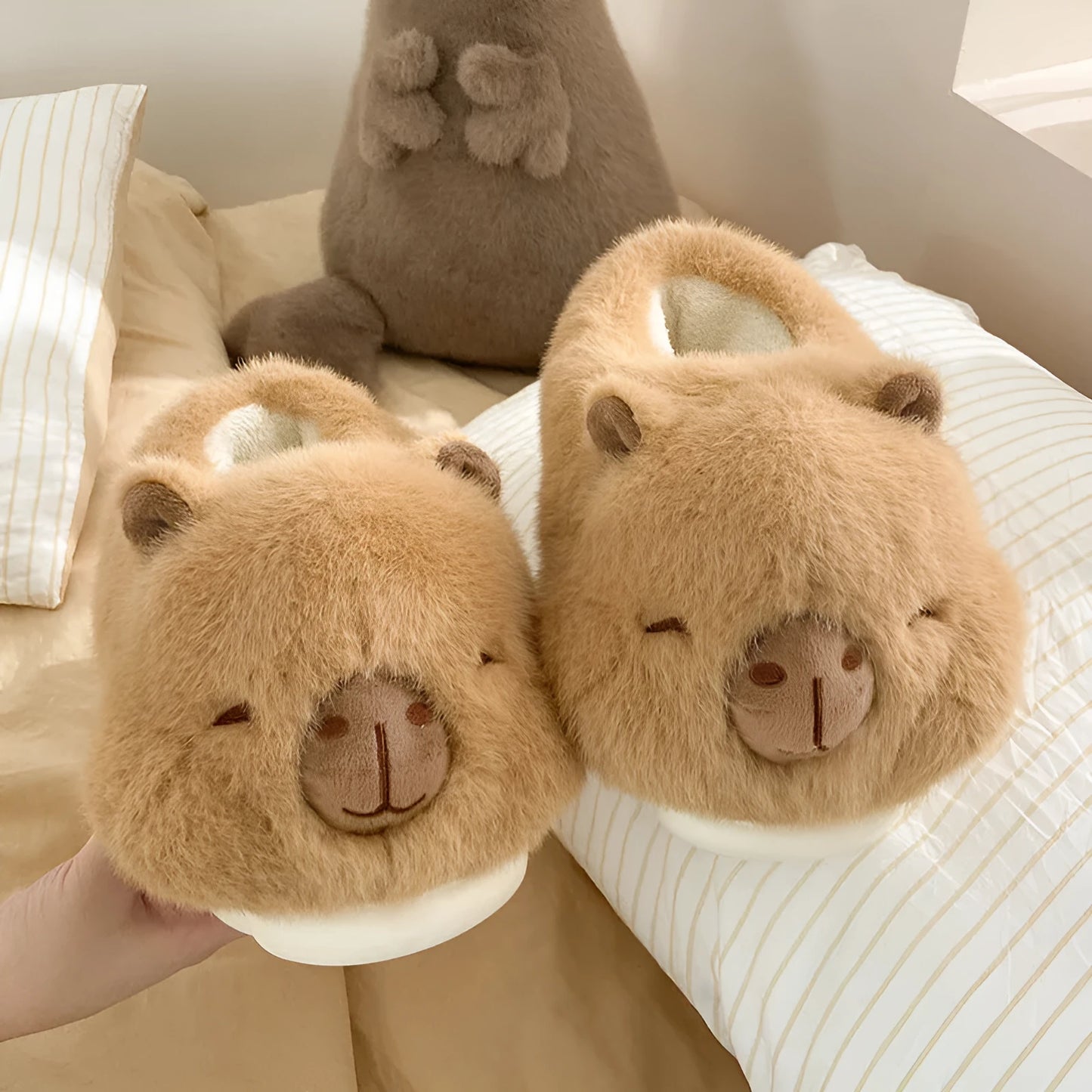 Light brown women's winter slippers with cartoon pattern, plush upper, and thick PVC sole