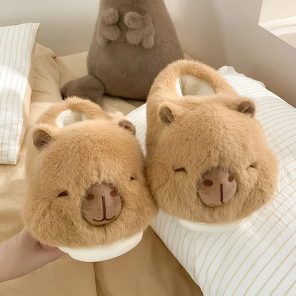 Light brown women's winter slippers with cartoon pattern, plush upper, and thick PVC sole