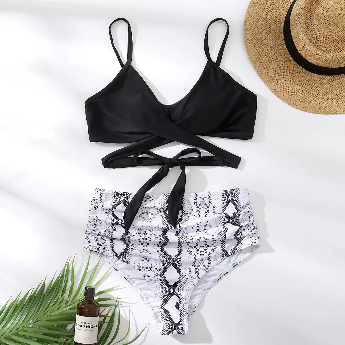 Spa Ladies Bikini Split Swimwear in multicolor patterns, featuring quick-drying nylon fabric.