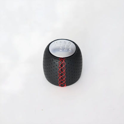 Alpha vehicle shift handball with wrapped perforated leather in black, red, or white line colours