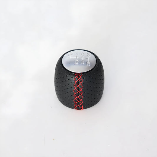 Alpha vehicle shift handball with wrapped perforated leather in black, red, or white line colours