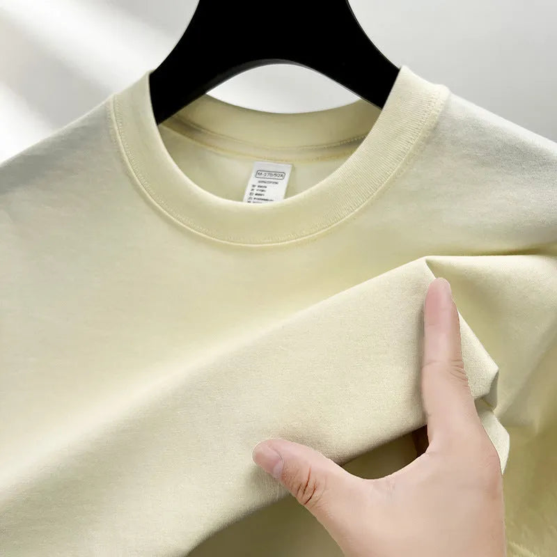Men's drop shoulder t-shirt in thin cotton fabric, shown in a solid colour.
