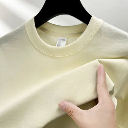 Men's drop shoulder t-shirt in thin cotton fabric, shown in a solid colour.