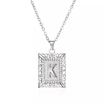 Personalized initial letter necklace in gold or steel, featuring any letter from A to Z