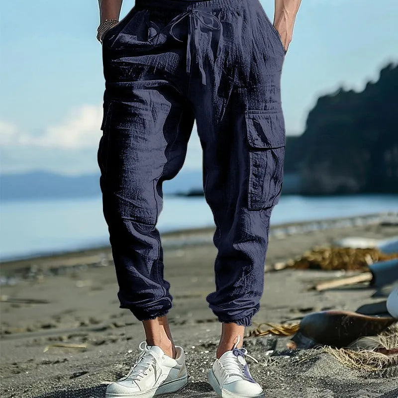 Men's linen trousers with ankle ties and multiple pockets in solid colour