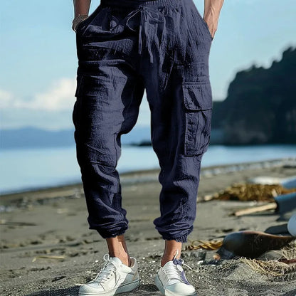 Men's linen trousers with ankle ties and multiple pockets in solid colour
