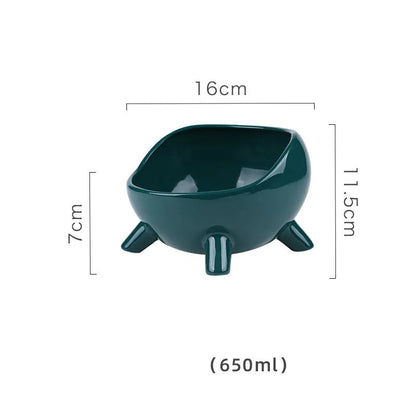 Green ceramic cat food bowl with four legs and elevated design for stable feeding
