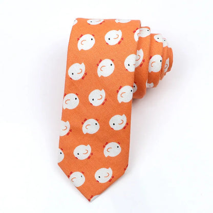 A narrow Korean-style cotton bow tie featuring a cartoon print, shown in a selection of colours.