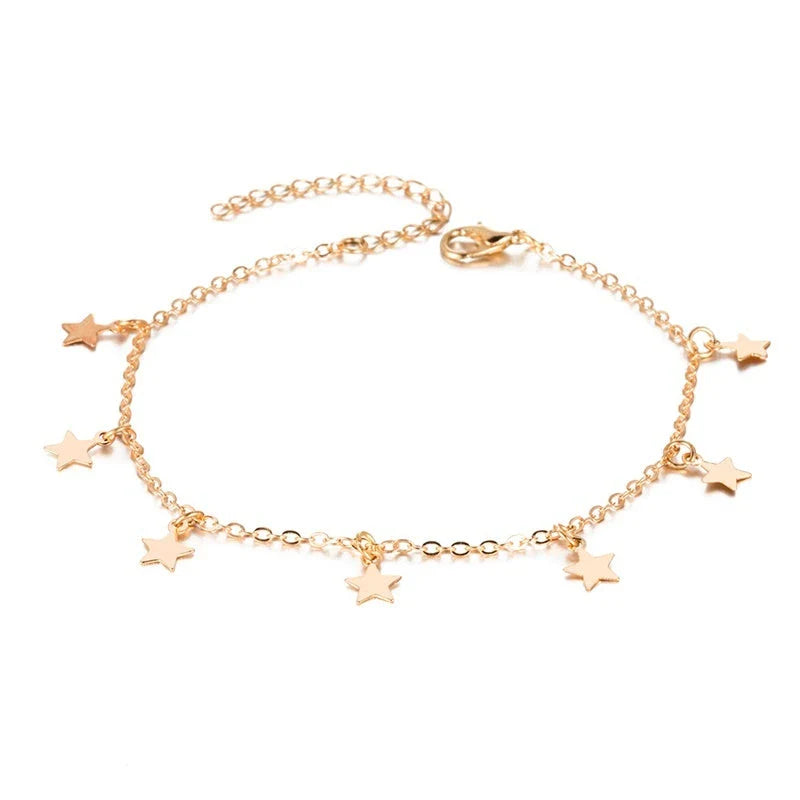 Trendy heart-shaped anklet with double-layered design and retro beach ball chain in gold, silver, and silvery colors.