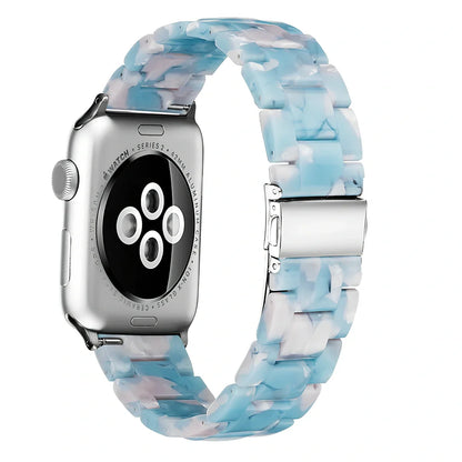 Slim resin Apple Watch strap showing attachment mechanism and colour options