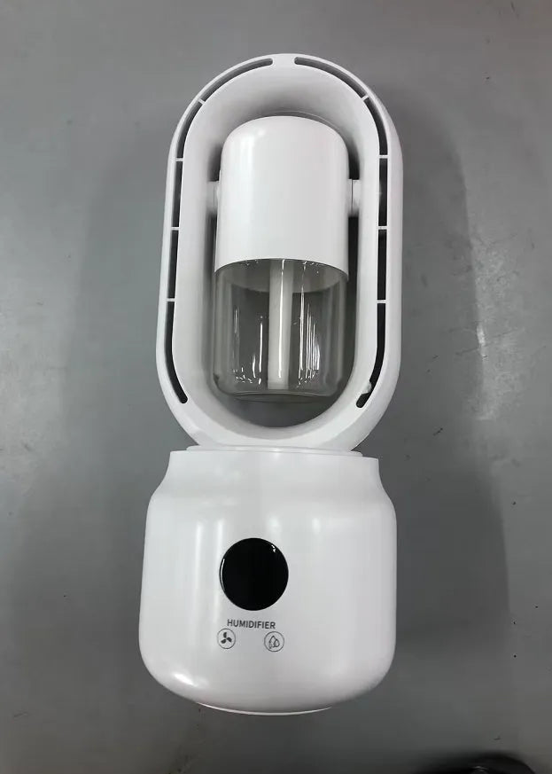 White bladeless portable table fan with humidifier tank on a wooden desk.