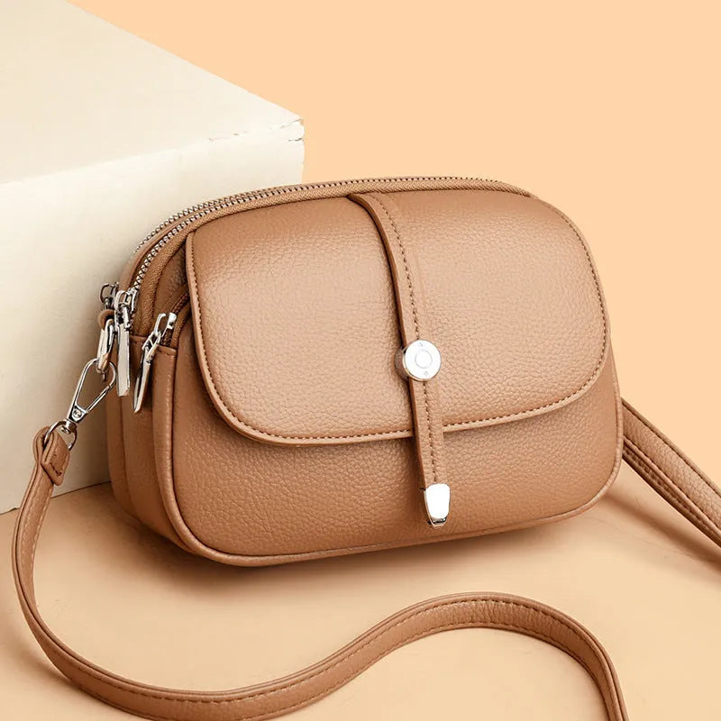 City Simple women's oval-shaped soft PU crossbody shoulder bag in black, khaki, or dark brown
