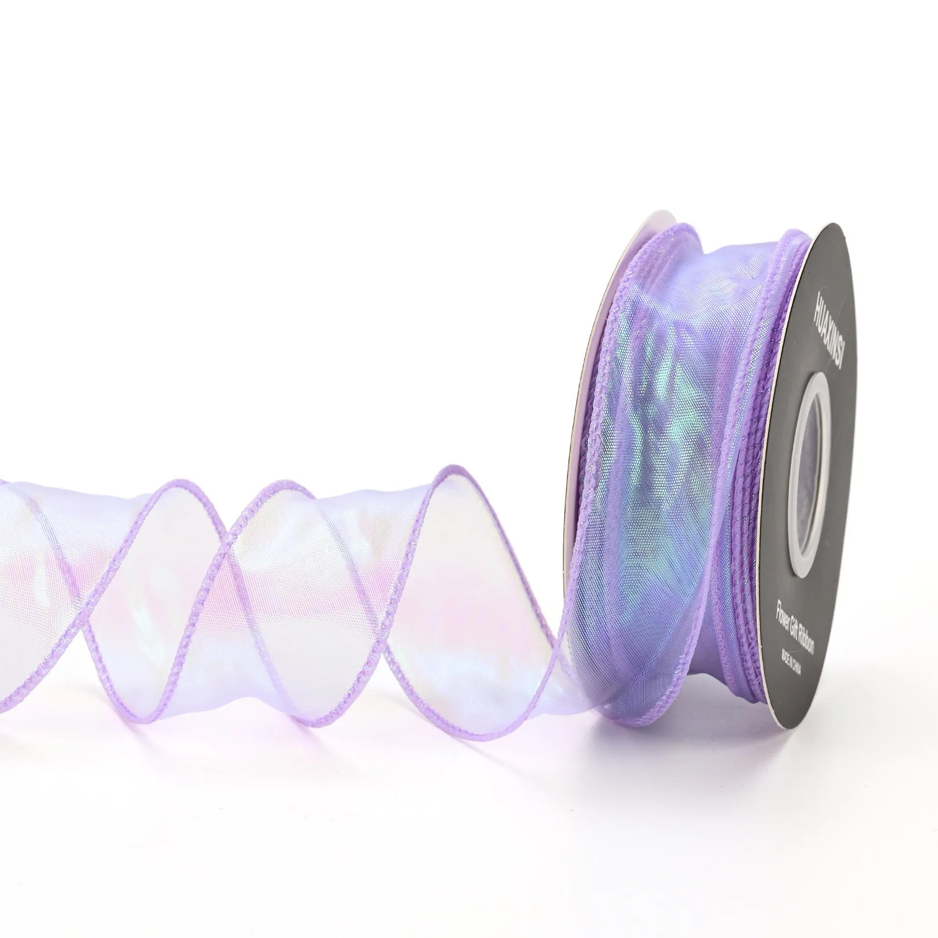 Fishtail yarn ribbon roll showing 4cm width and edge cutting detail in illusion colour options