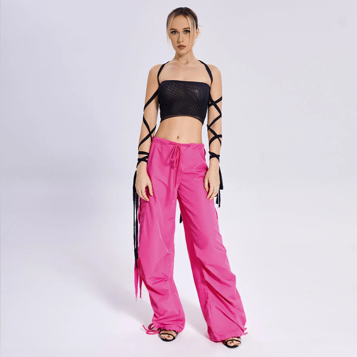 Stylish women's black tank top with elastic cross-arm design, perfect for casual summer wear