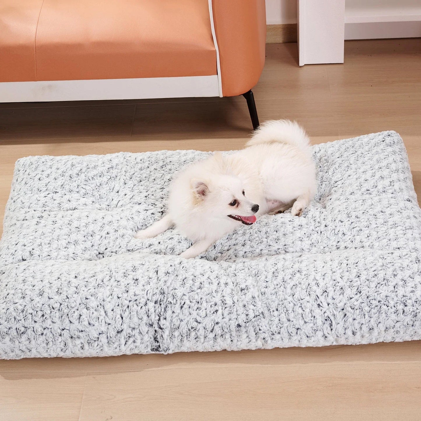 Plush pet bed with rose velvet exterior, thick supportive cushion, and removable cover for easy cleaning
