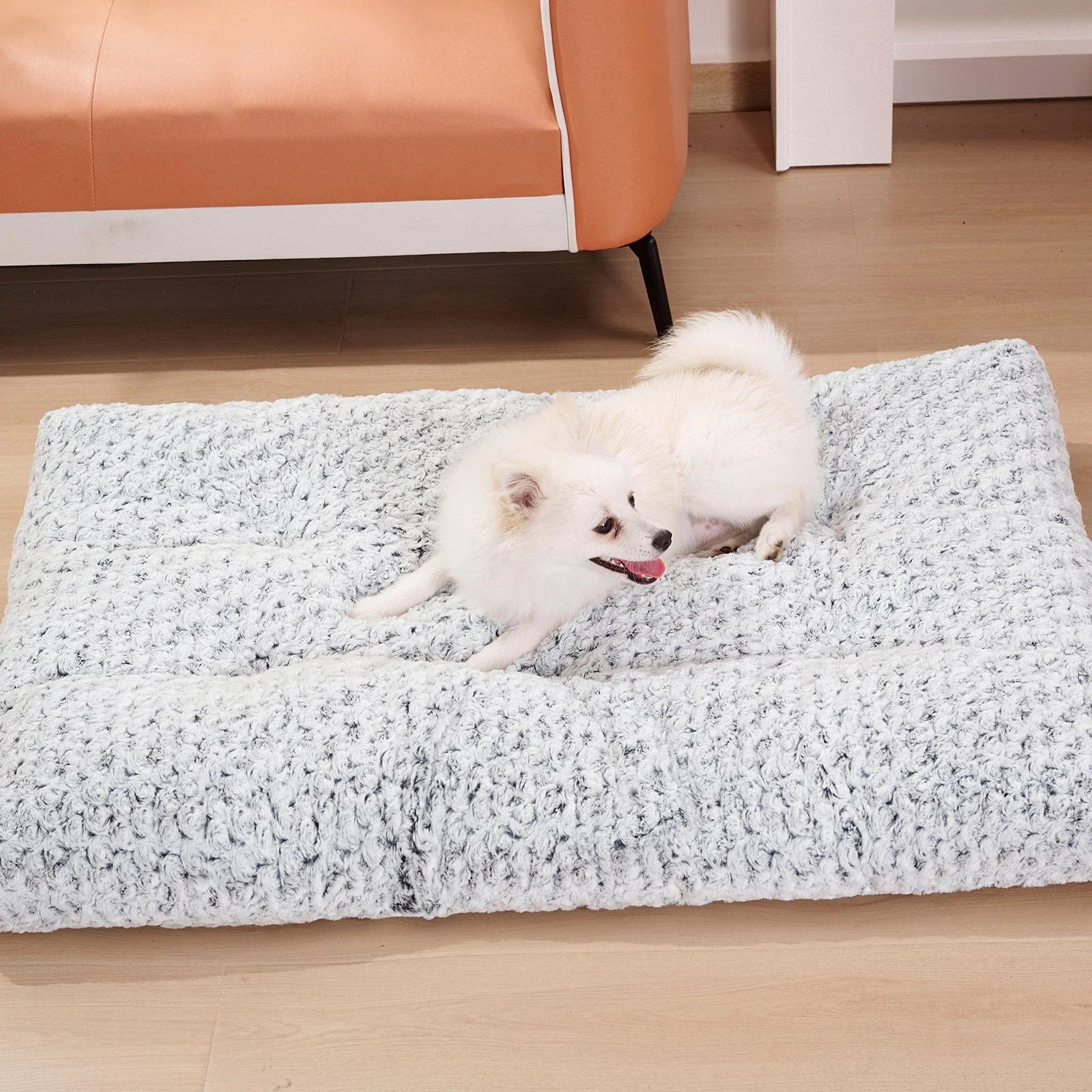 Plush pet bed with rose velvet exterior, thick supportive cushion, and removable cover for easy cleaning