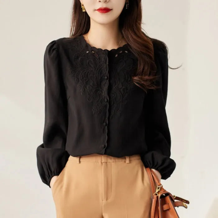 Round neck long sleeve shirt with lantern sleeves and geometric 3D pattern in purple, white, or black, sizes S to 2XL.