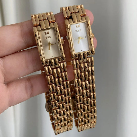 Bracelet-style women's watch with 15mm dial, 7mm thickness, mineral glass, and butterfly buckle in silver or gold.
