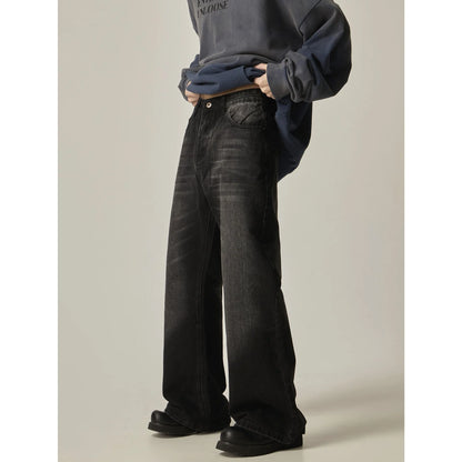 Black loose straight jeans with retro styling, zipper fly, and inelastic denim fabric