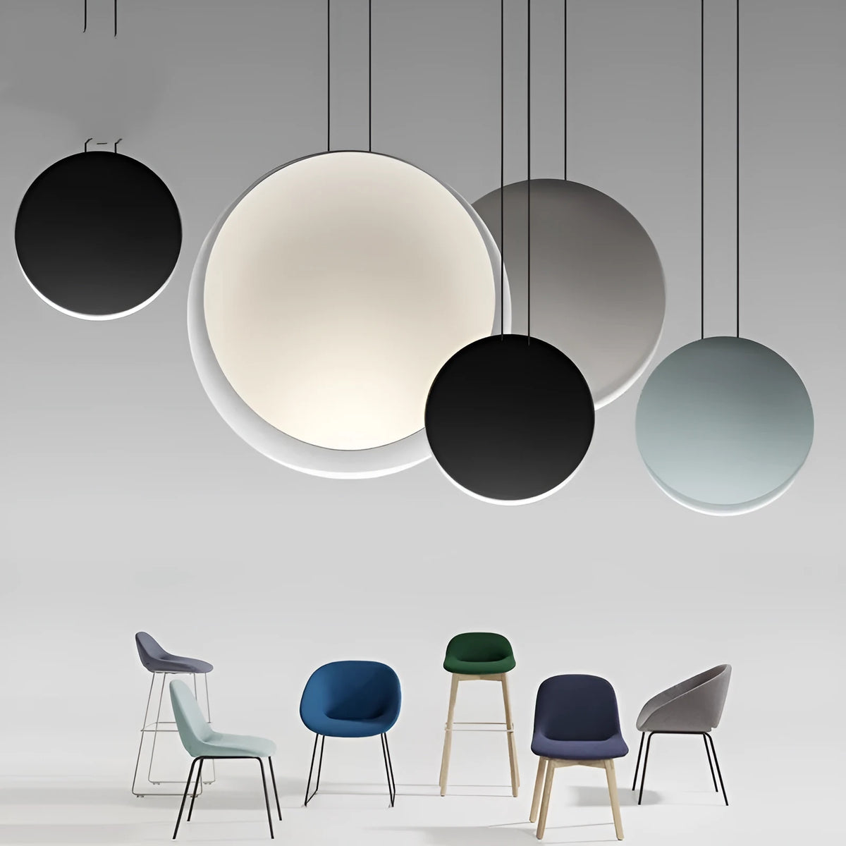 Round resin cosmos chandelier light with adjustable hanging height, shown in a bedroom setting.