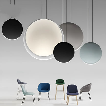 Round resin cosmos chandelier light with adjustable hanging height, shown in a bedroom setting.