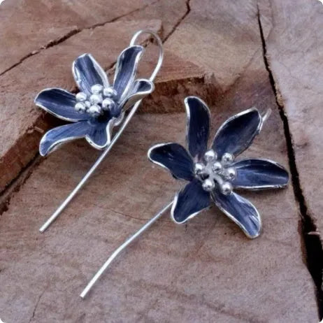 Purple flower-shaped alloy earrings with electroplated finish and post fastening