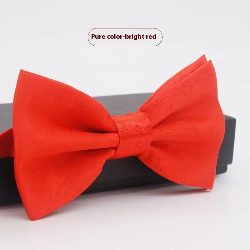 Flat-head self-tie bow tie in a wine red colour, showing its 12cm width and 6cm height dimensions.