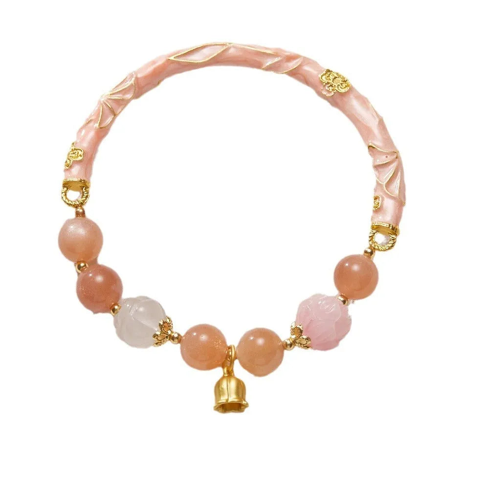 Chinese style sunstone and jade half bracelet with lily motifs measuring 20-24cm