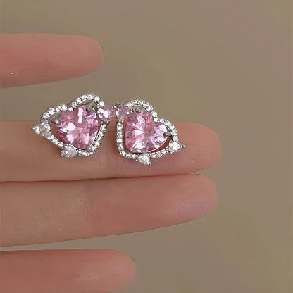 Guardian Heart white K coloured copper stud earrings with heart shape design
