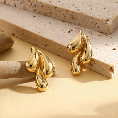 Vintage gold and silver double water drop earrings with glossy finish