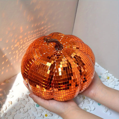 A Chinese-style embroidered glass pumpkin Halloween decoration in various sizes.
