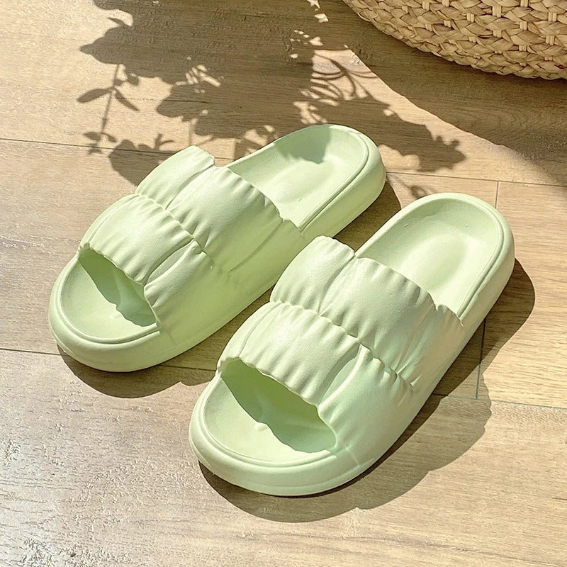 Comfortable and stylish women's bathroom slides in various vibrant colors and patterns