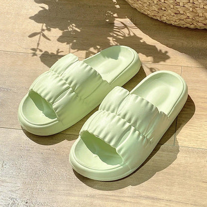 Comfortable and stylish women's bathroom slides in various vibrant colors and patterns
