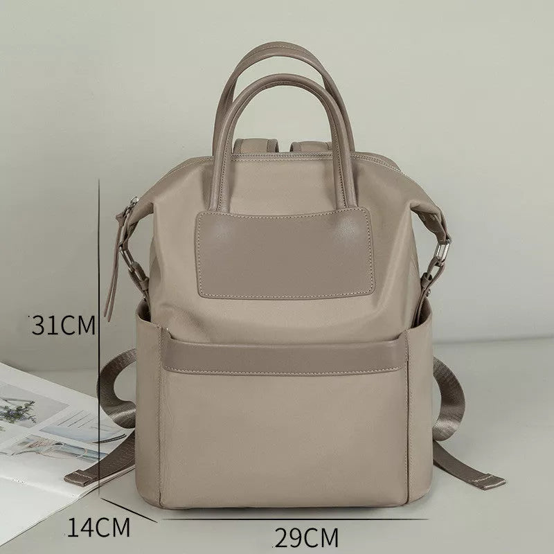 Women's lightweight waterproof backpack with hand-hold design in khaki and black