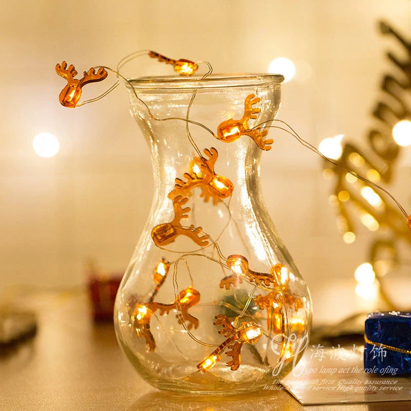 Customizable Christmas LED string lights in various designs including gift, bell, and Christmas tree shapes