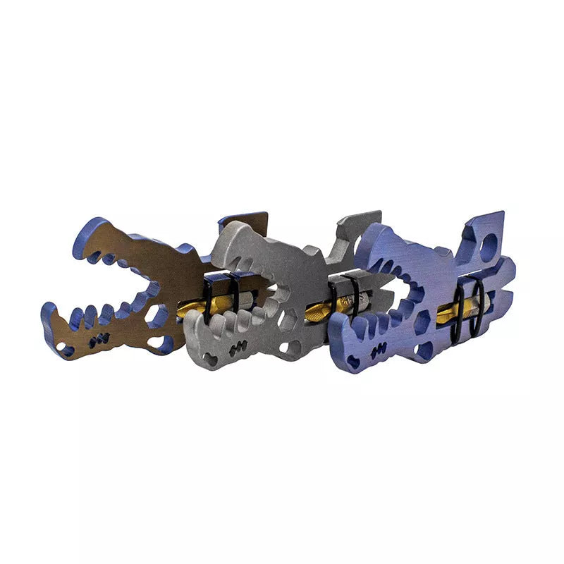 Dinosaur Head Tool in TC4 titanium, available in grey, blue, and copper