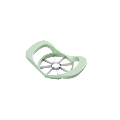 Hand-cranked ABS plastic peeler machine with suction cup base in light green colour