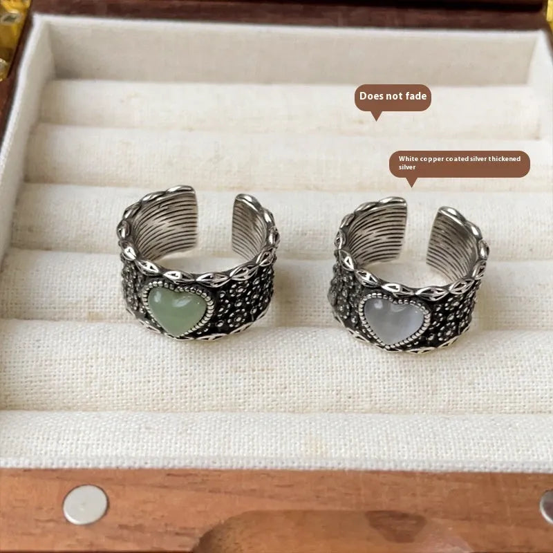 Retro wide-faced heart-shaped silver ring with adjustable opening in white or green colour