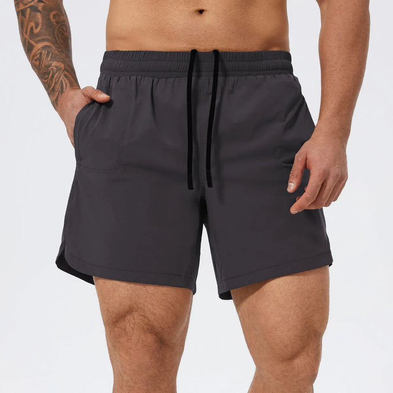Men's basketball tennis running shorts in moisture-wicking nylon with mid waist design, available in black, medium grey, wine red, and light blue colour options in S, M, L, XL, XXL Asian fit sizing for court and training use